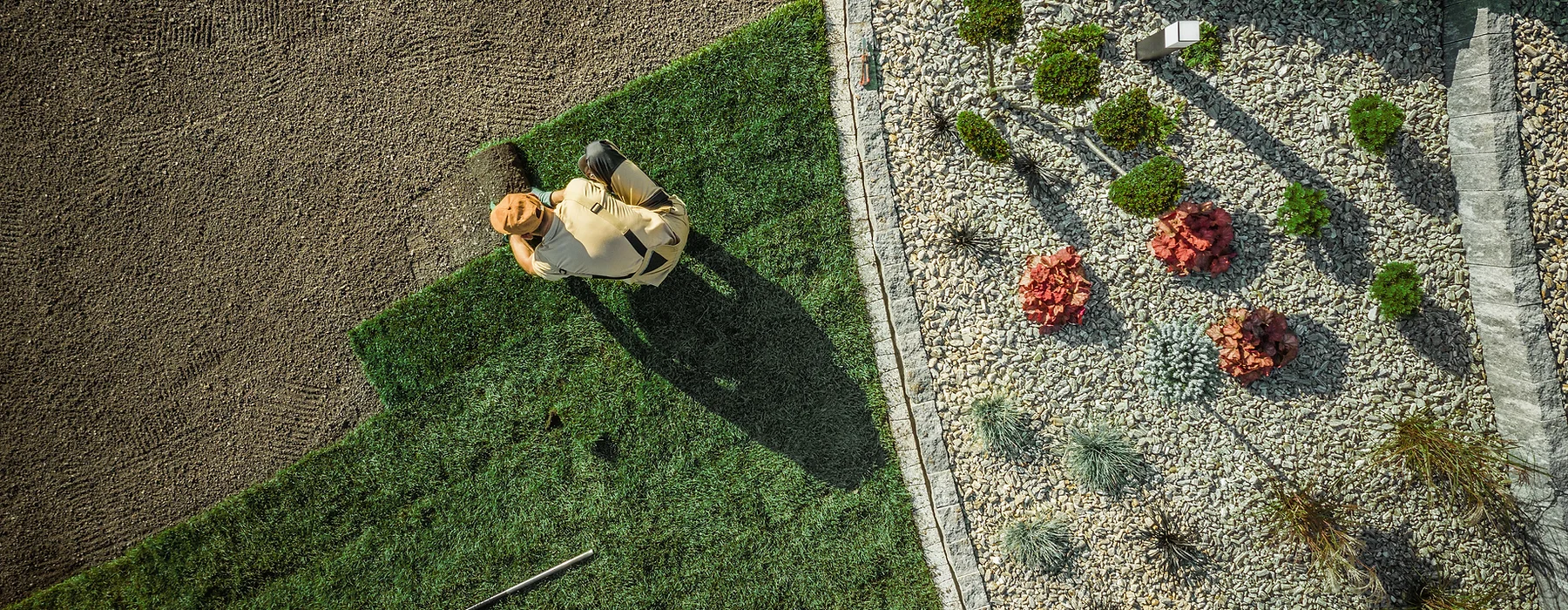 GNIX team installing grass carpet on site